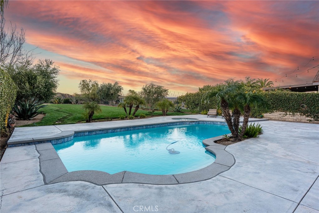28201 Springvale Lane Castaic, CA 91384 - Photo 29 of 59 a view of a swimming pool with a yard