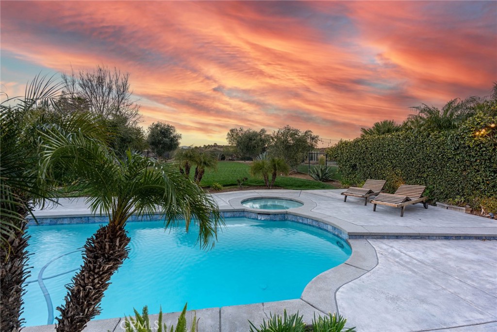 28201 Springvale Lane Castaic, CA 91384 - Photo 32 of 59 a view of a swimming pool and lounge chairs