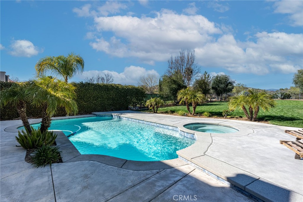 28201 Springvale Lane Castaic, CA 91384 - Photo 42 of 59 a view of a garden with a bench