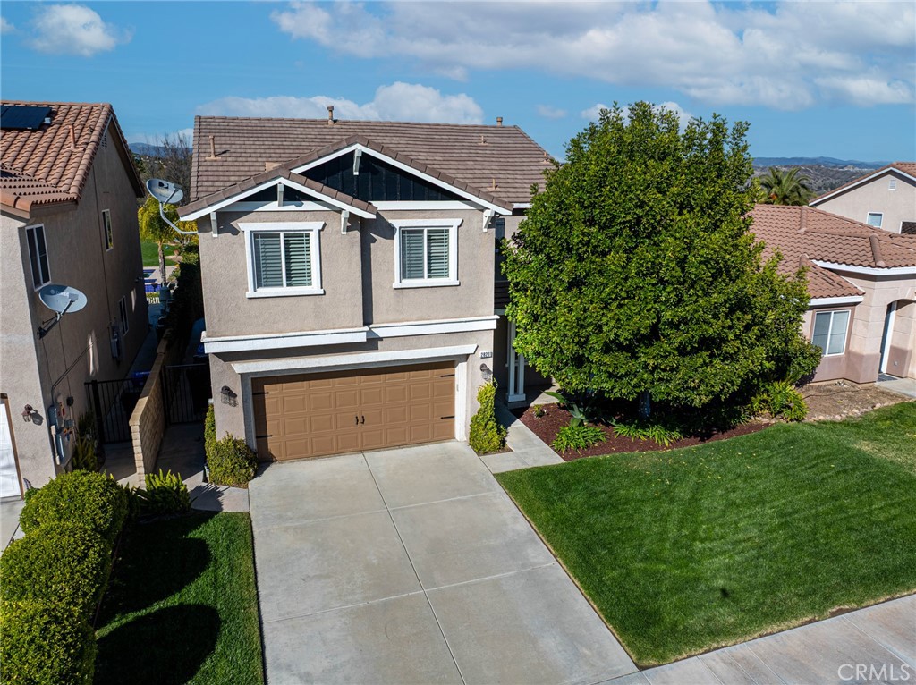 28201 Springvale Lane Castaic, CA 91384 - Photo 54 of 59 a front view of a house with a yard