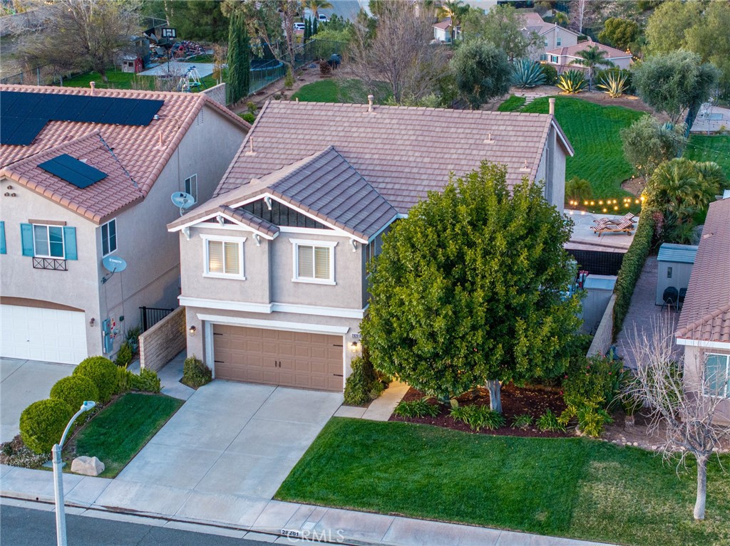 28201 Springvale Lane Castaic, CA 91384 - Photo 56 of 59 a aerial view of a house with a yard and potted plants