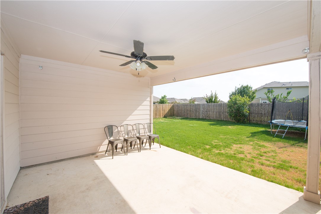 1007 Plateau Trail Georgetown, TX 78626 - Photo 28 of 32 a view of a patio with a table and chairs