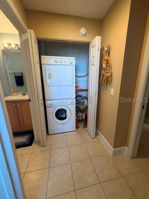 13413 Gasparilla Road, Unit 304 Placida, FL 33946 - Photo 21 of 28 a bathroom with a washing machine and a shower