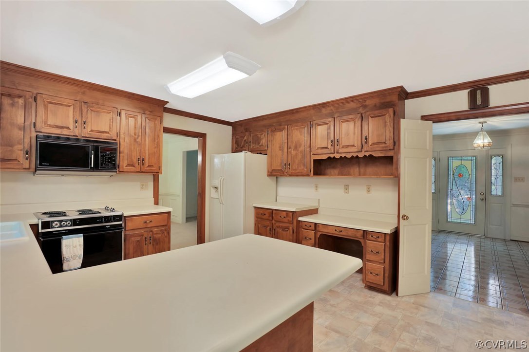 9604 St Regis Terrace North Chesterfield, VA 23236 - Photo 11 of 32 a kitchen with stainless steel appliances granite countertop a refrigerator stove microwave and sink