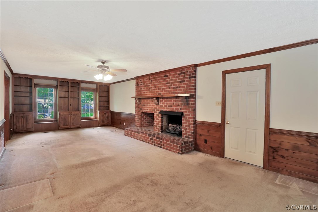 9604 St Regis Terrace North Chesterfield, VA 23236 - Photo 14 of 32 a view of a livingroom with an empty space and fire place