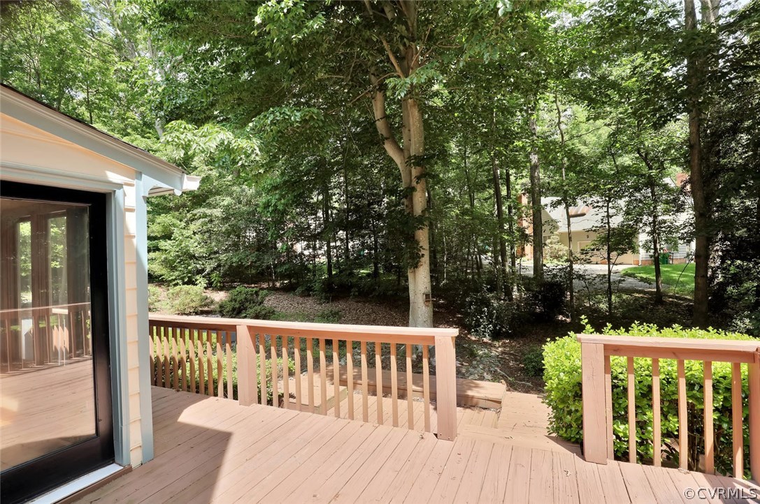 9604 St Regis Terrace North Chesterfield, VA 23236 - Photo 28 of 32 a view of a wooden deck and a backyard