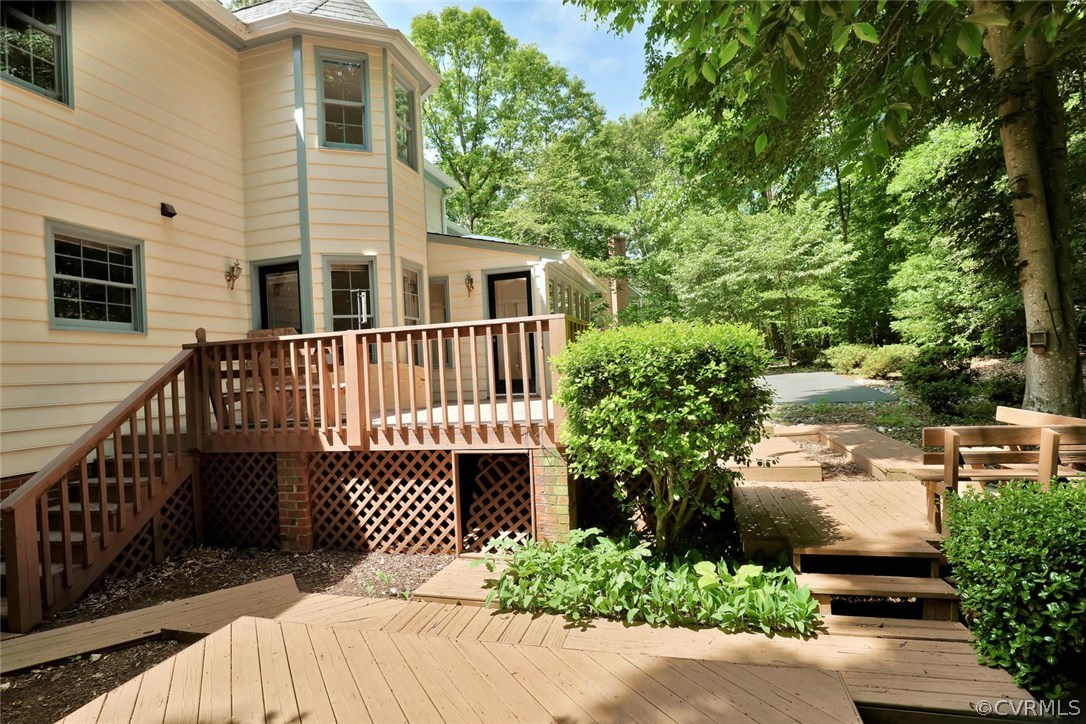 9604 St Regis Terrace North Chesterfield, VA 23236 - Photo 29 of 32 a view of a house with a small yard and wooden fence