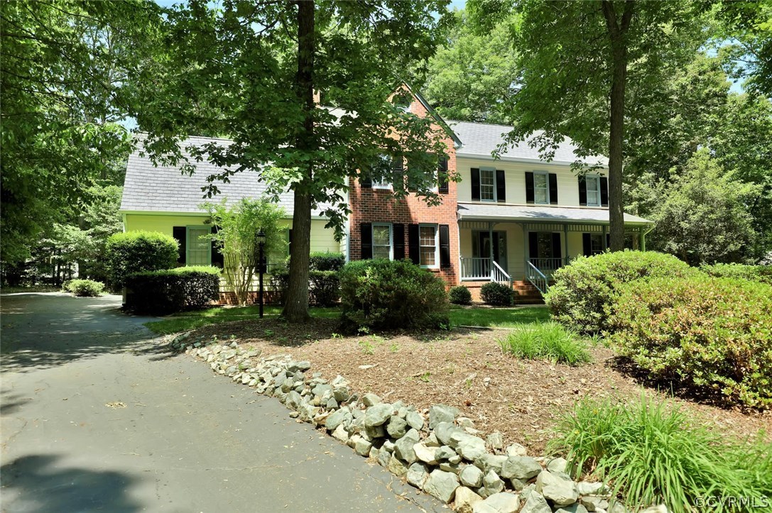 9604 St Regis Terrace North Chesterfield, VA 23236 - Photo 32 of 32 a front view of a house with a garden