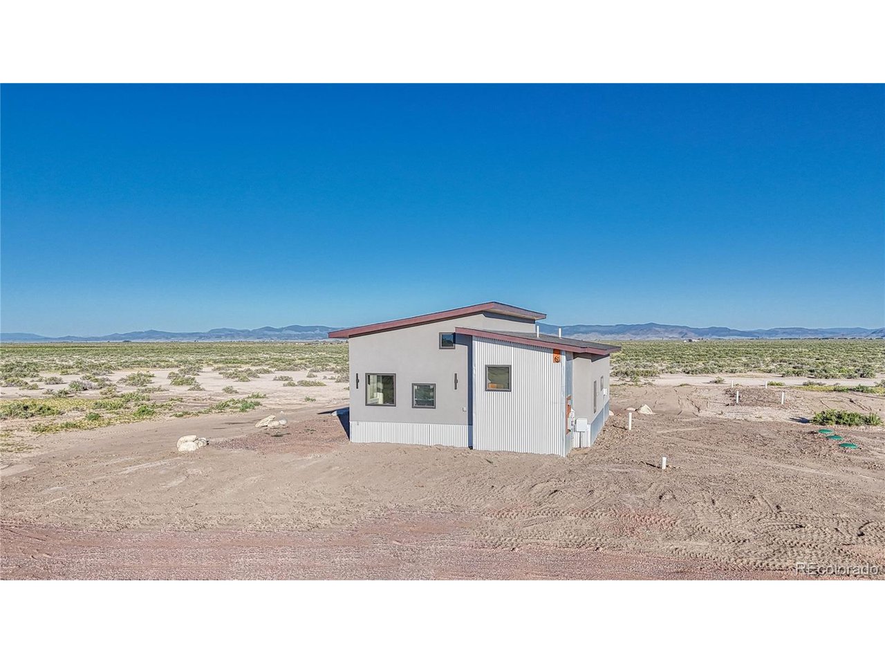 57884 Co Road Moffat, CO 81143 - Photo 7 of 40 Looking West/East Side of House