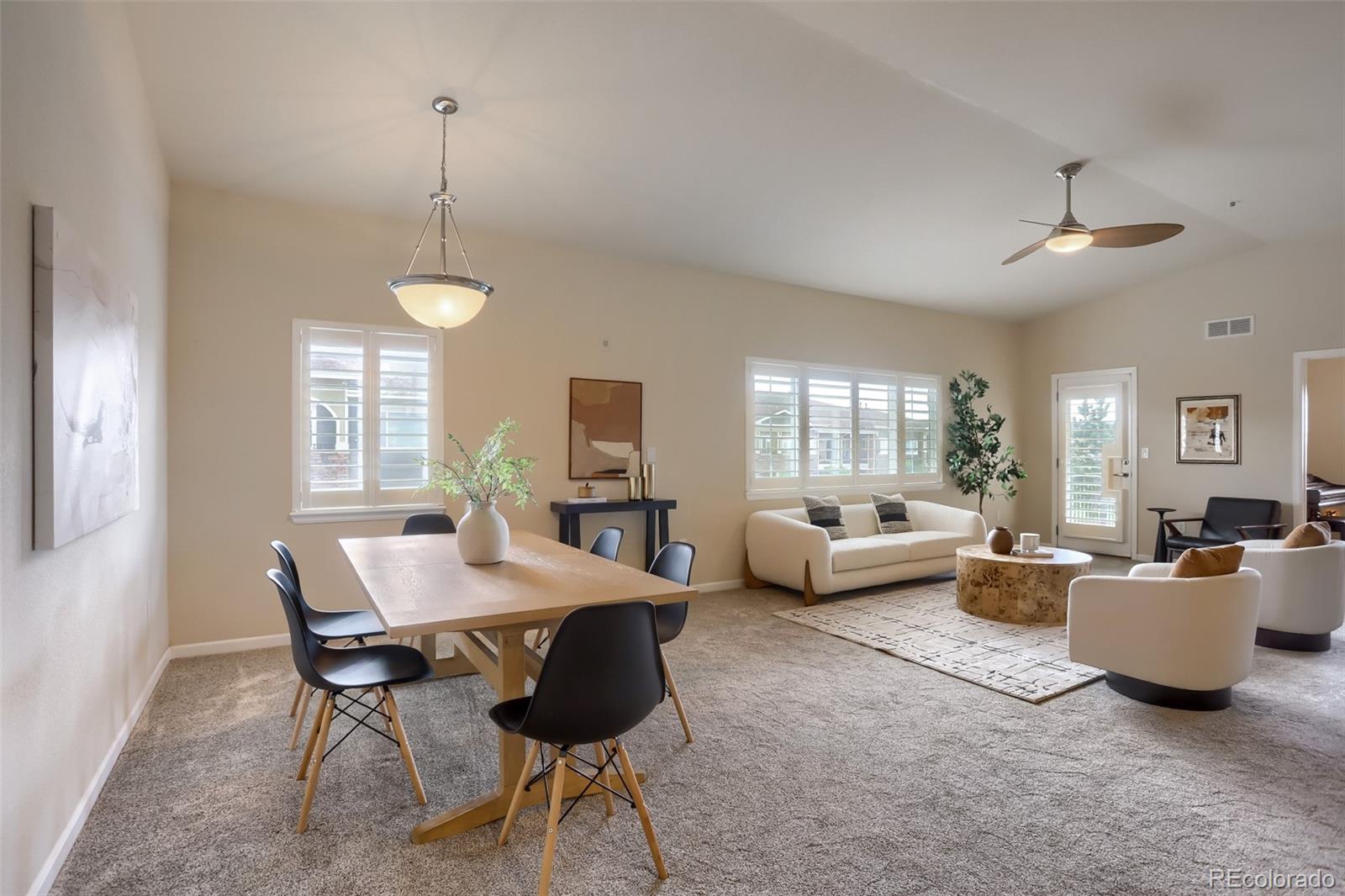6232 Kilmer Loop, Unit 203 Golden, CO 80403 - Photo 11 of 33 a view of a dining room with furniture window and outside view