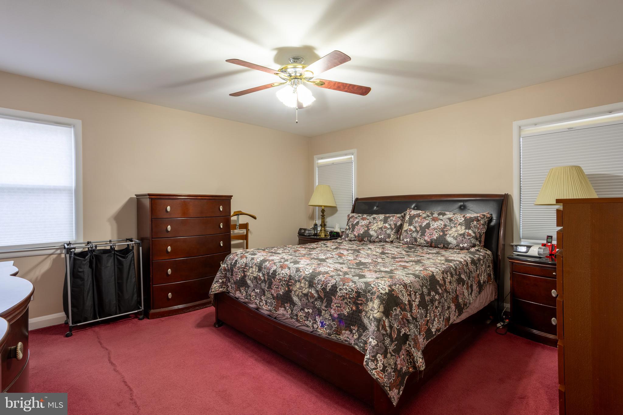 3215 Northbrook Road Baltimore, MD 21208 - Photo 20 of 50 a bedroom with a bed and cabinets