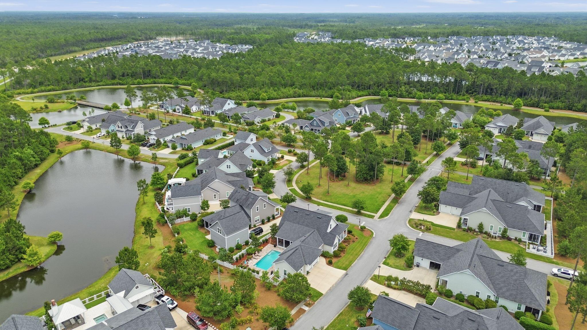 133 Sandchase Circle, Unit LOT 15 Inlet Beach, FL 32461 - Photo 36 of 47 an aerial view of residential houses with outdoor space and river