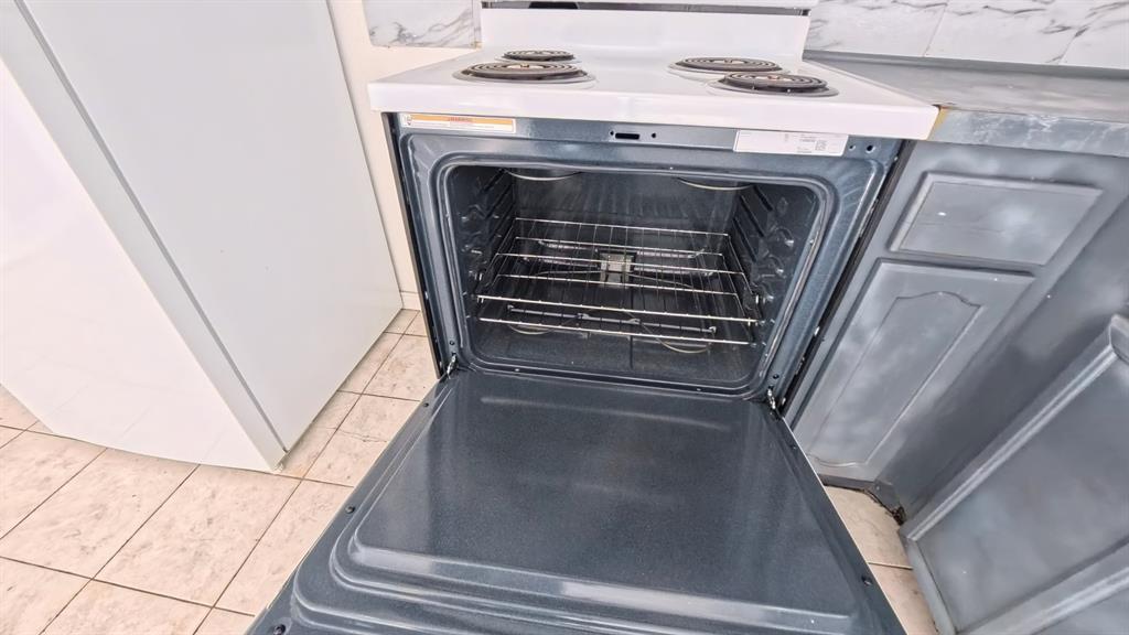 301 Gatewood Road Garland, TX 75043 - Photo 12 of 15 a close view of washer and dryer