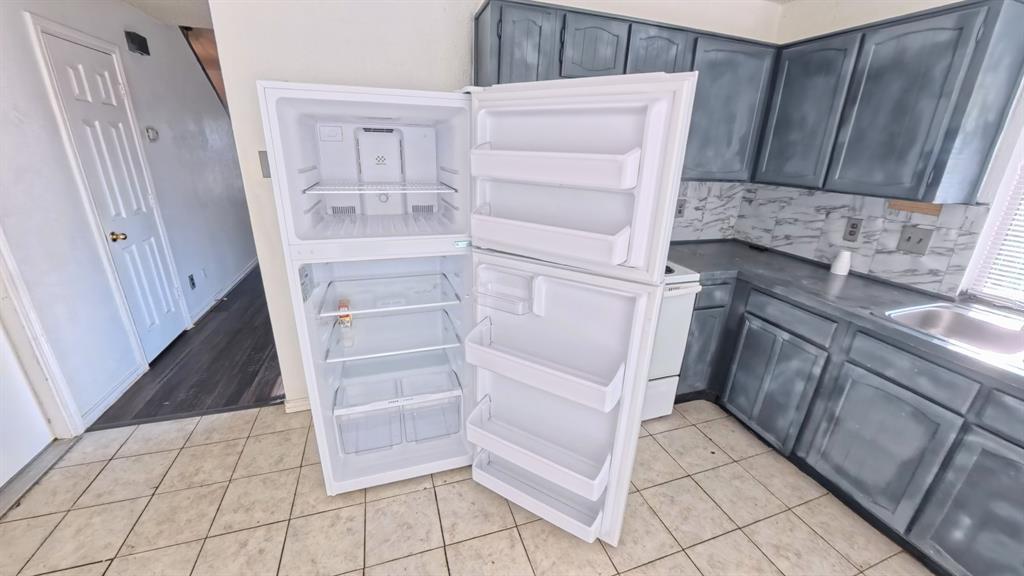 301 Gatewood Road Garland, TX 75043 - Photo 13 of 15 a view of walk in closet