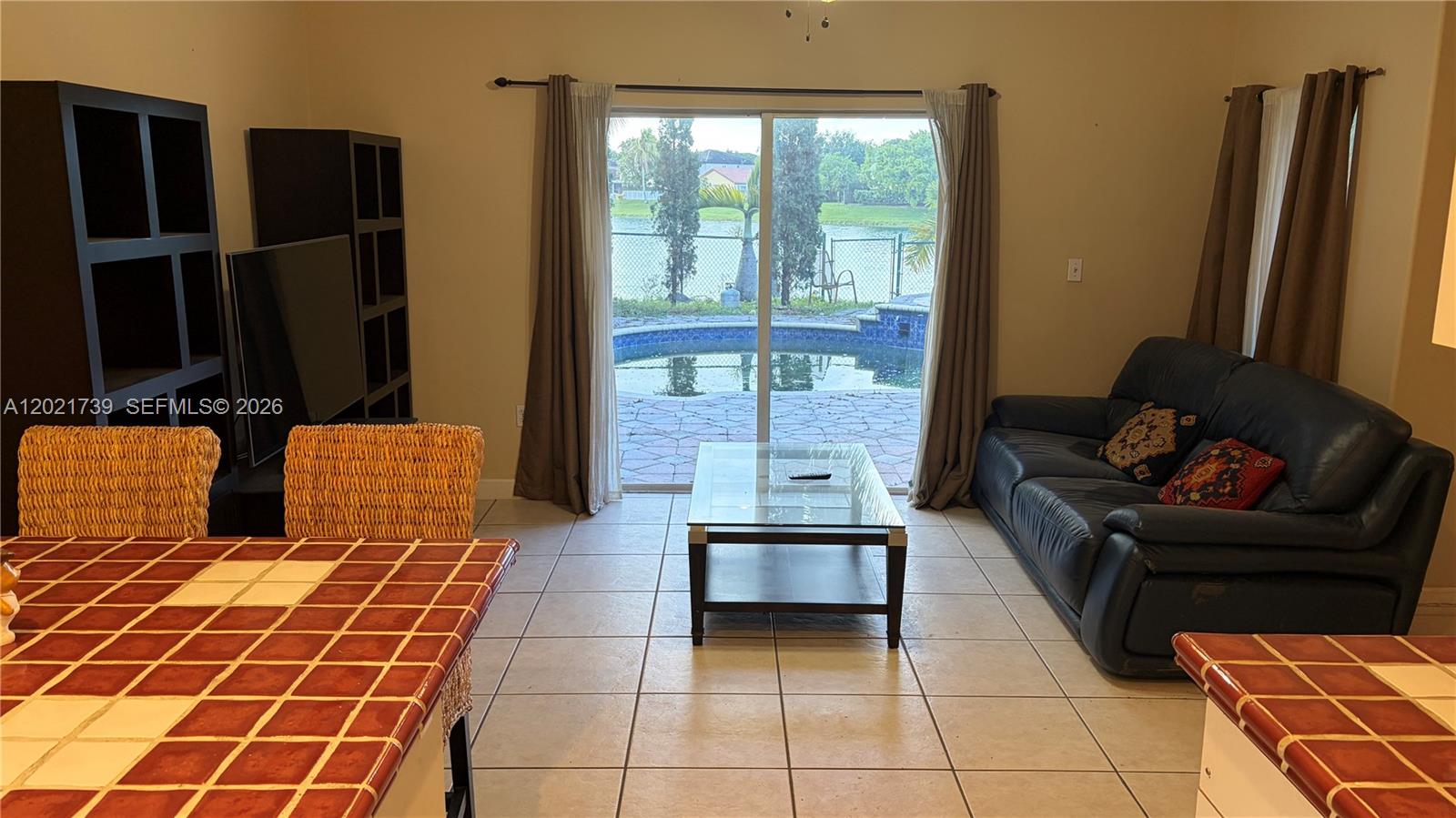 13553 Southwest 124th Avenue Road Miami, FL 33186 - Photo 12 of 31 a living room with furniture