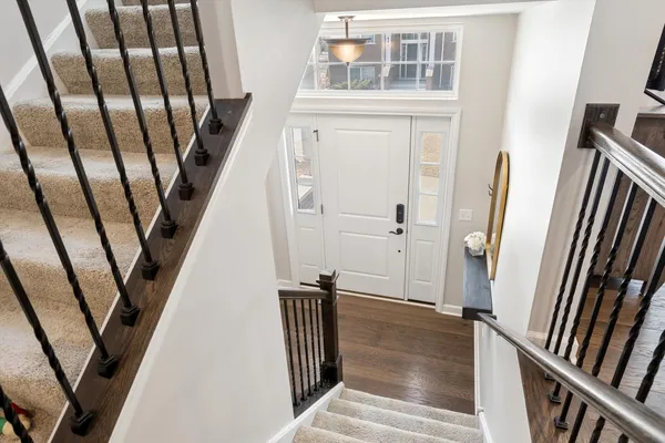 a view of an entryway with a kitchen