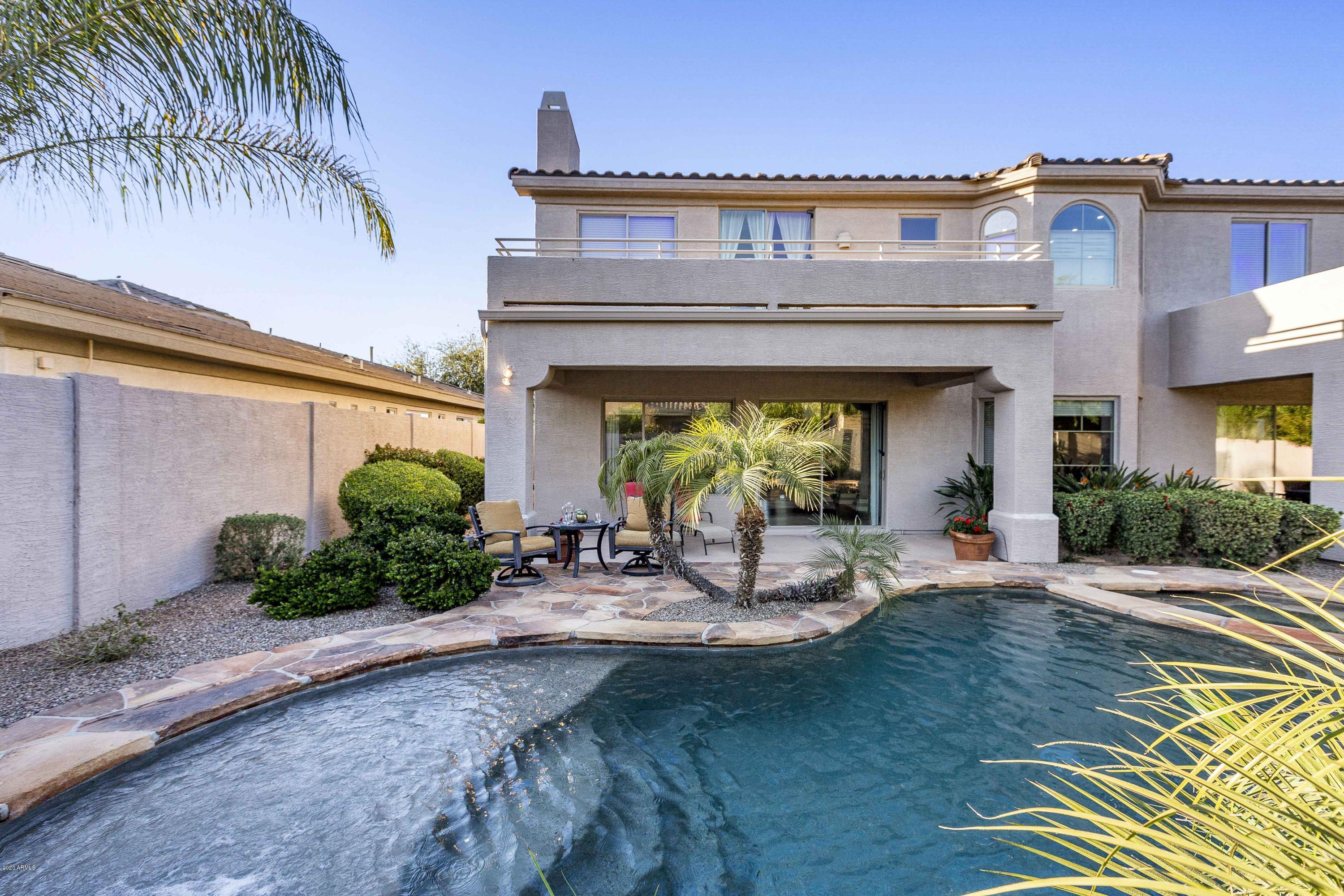 4583 East Desperado Road Gilbert, AZ 85297 - Photo 54 of 70 a view of a house with a patio