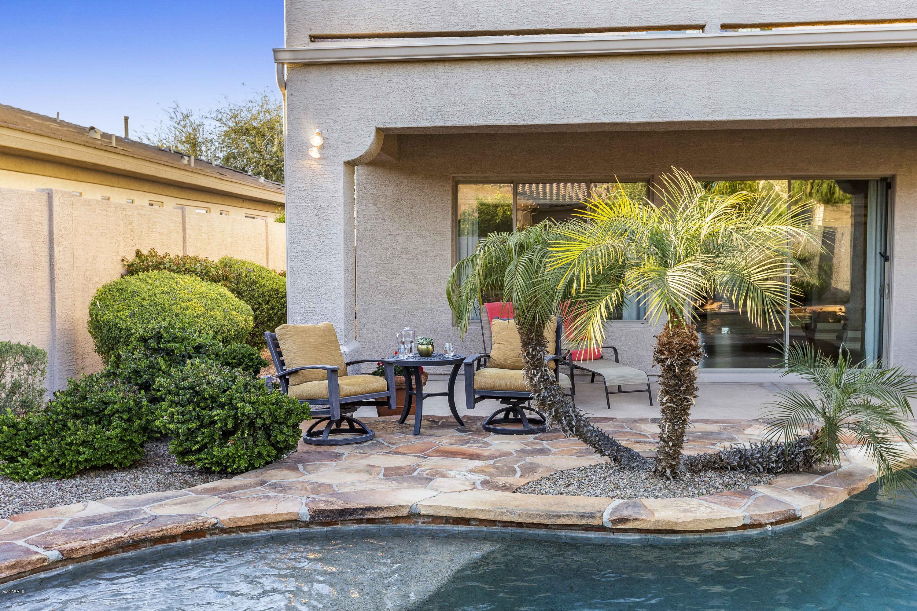 4583 East Desperado Road Gilbert, AZ 85297 - Photo 55 of 70 a view of a chairs and table in the patio