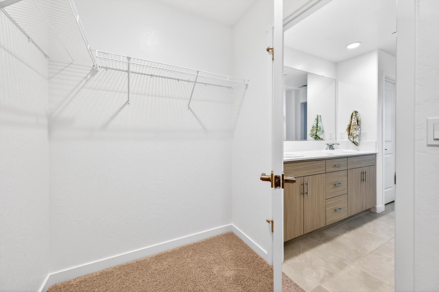 317 Talus Way South Madera, CA 93636 - Photo 35 of 61 a view of a bathroom with a sink