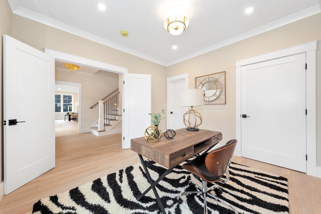 19 Cherokee Road Arlington, MA 02474 - Photo 18 of 42 a living room with furniture and wooden floor