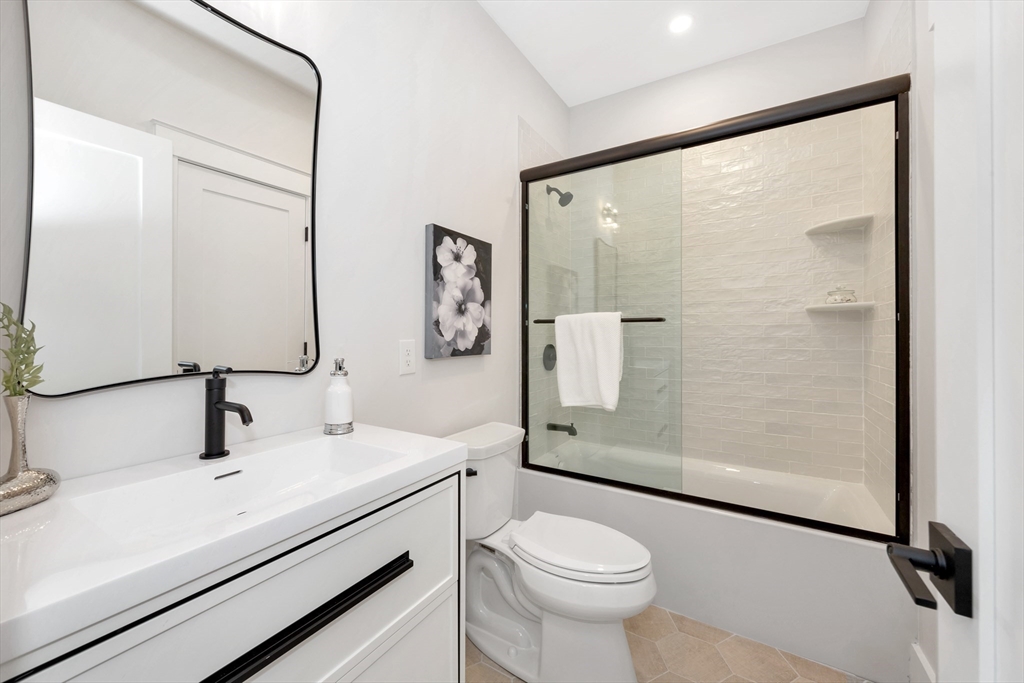 19 Cherokee Road Arlington, MA 02474 - Photo 19 of 42 a bathroom with a sink toilet and shower