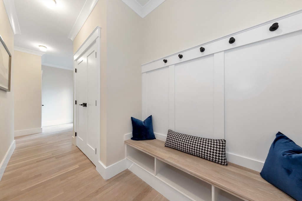 19 Cherokee Road Arlington, MA 02474 - Photo 20 of 42 a view of a bedroom with wooden floor