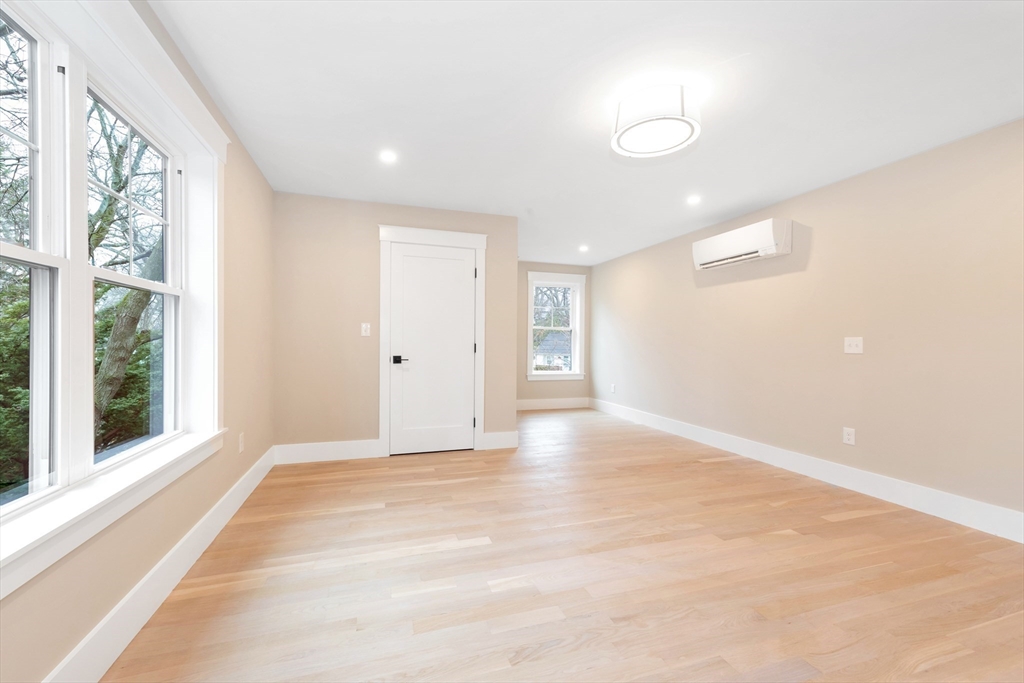 19 Cherokee Road Arlington, MA 02474 - Photo 21 of 42 a view of an empty room with a window
