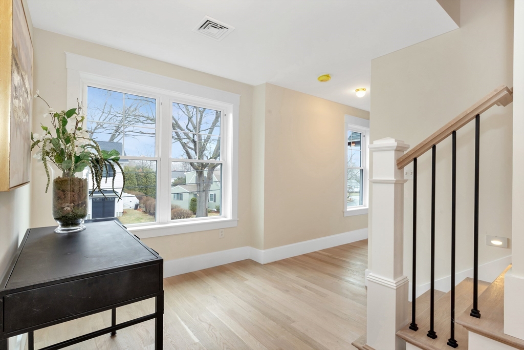 19 Cherokee Road Arlington, MA 02474 - Photo 24 of 42 a view of a dining room with furniture window and wooden floor