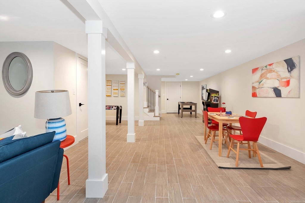 19 Cherokee Road Arlington, MA 02474 - Photo 37 of 42 a living room with furniture and a wooden floor