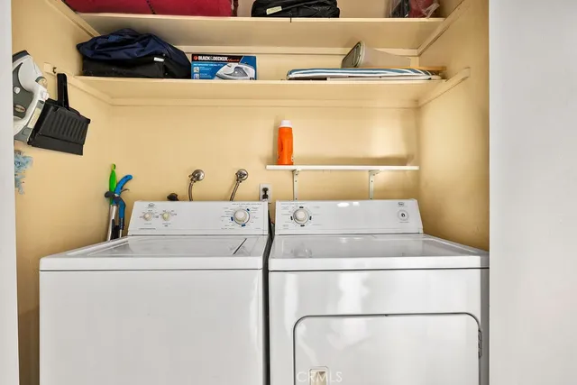 a view of a patio with a yard