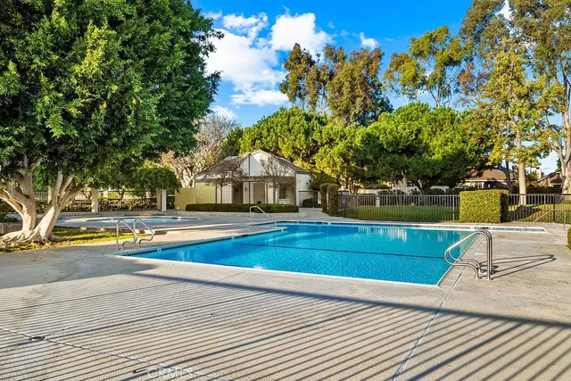 a view of house with garden and plants