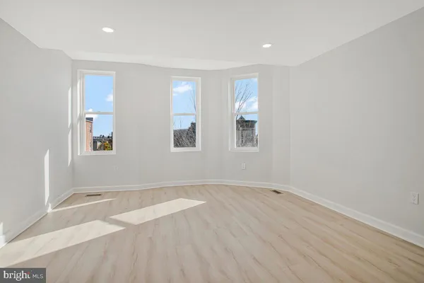 an empty room with windows