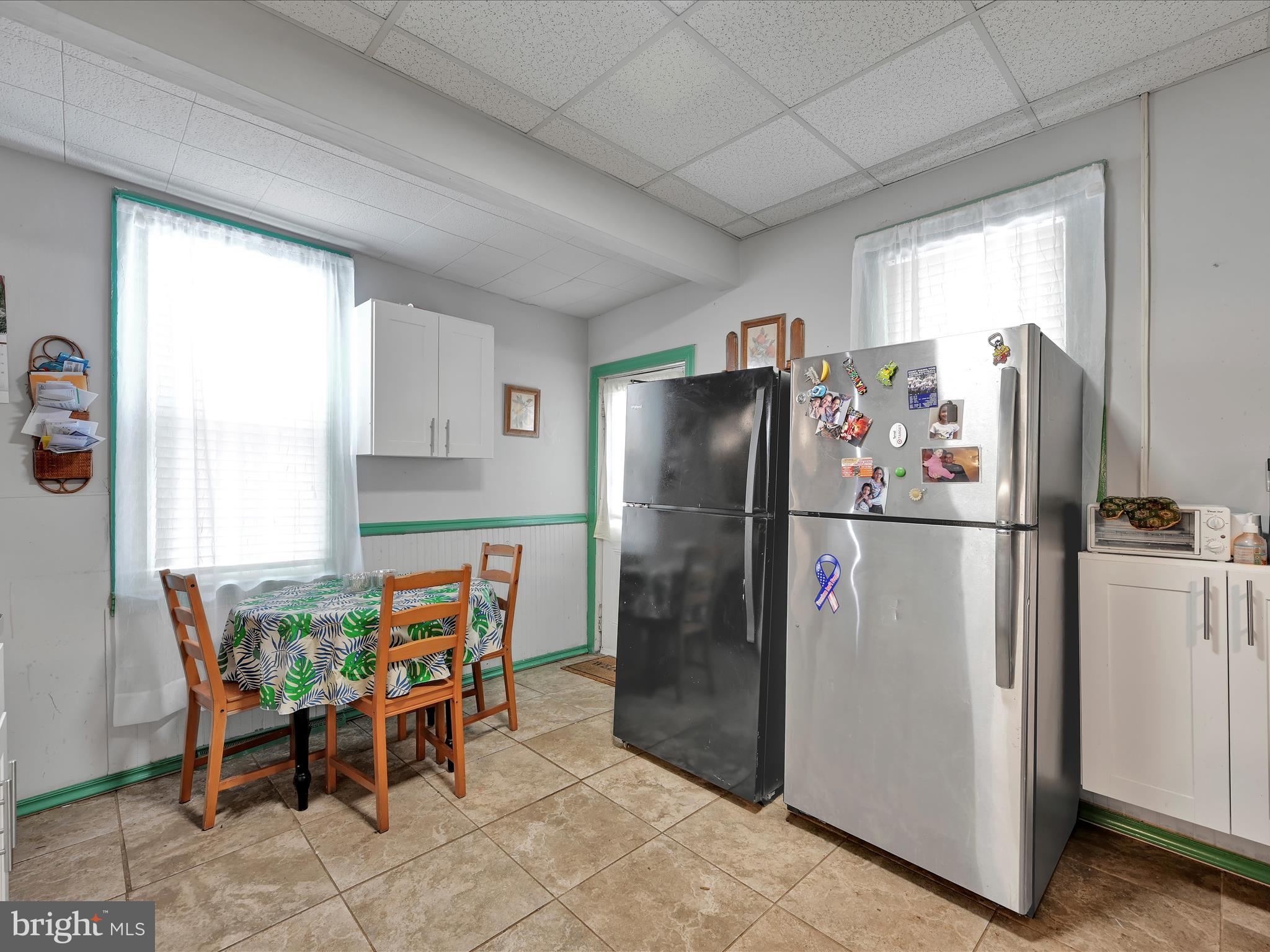 337 South 9th Street Lebanon, PA 17042 - Photo 11 of 26 a view of kitchen with refrigerator and dining table