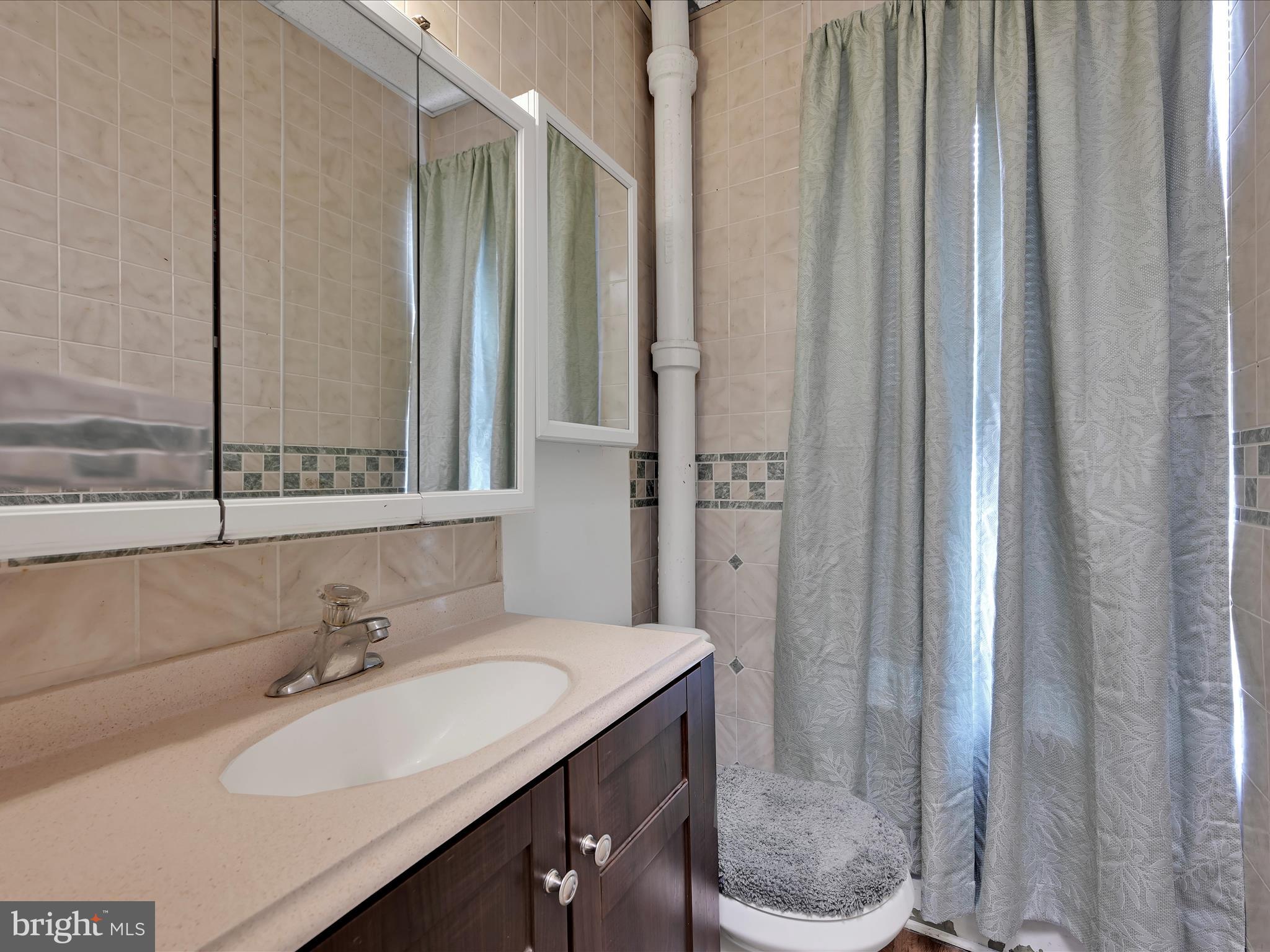 337 South 9th Street Lebanon, PA 17042 - Photo 17 of 26 a bathroom with a sink toilet and shower