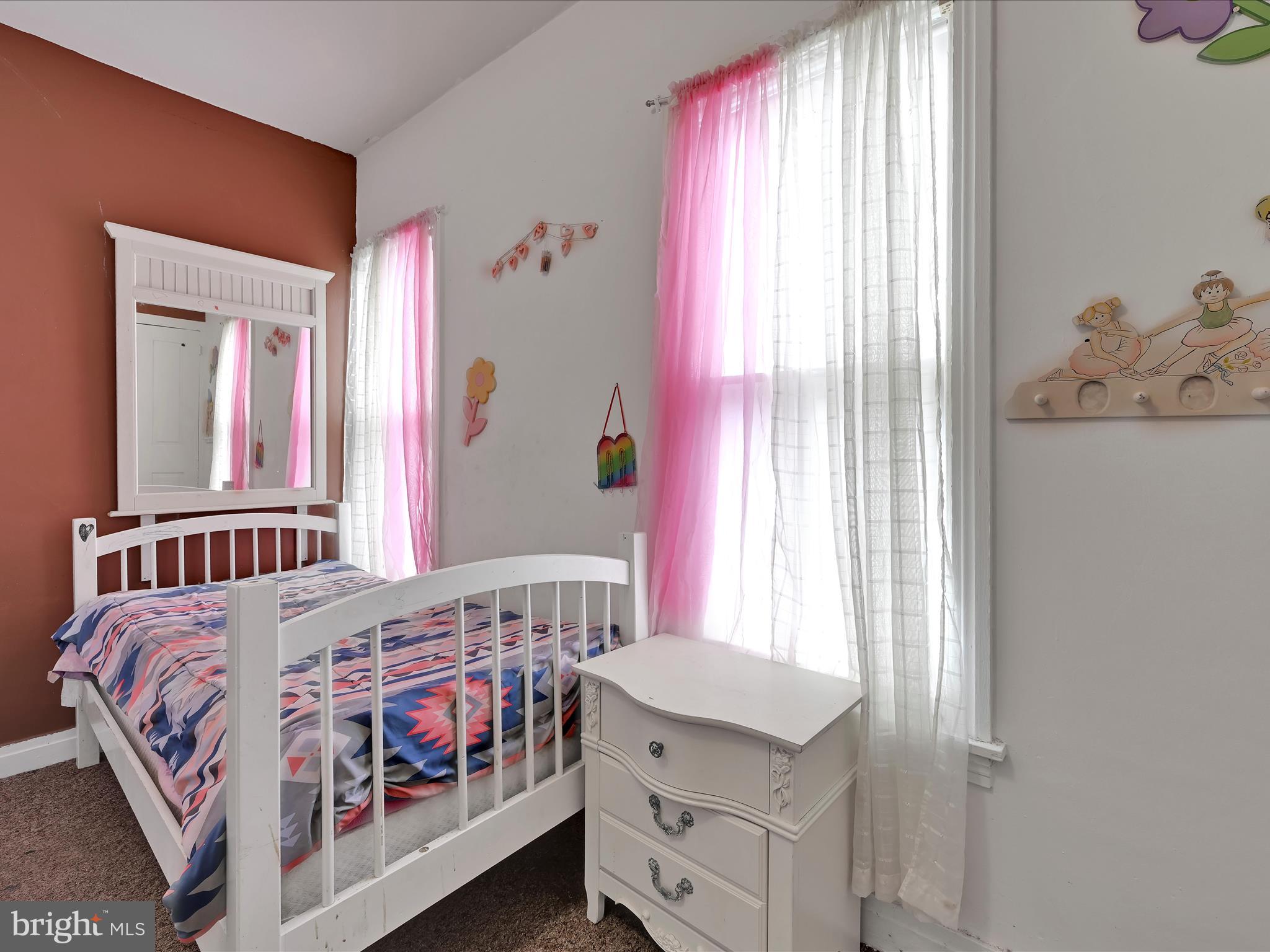 337 South 9th Street Lebanon, PA 17042 - Photo 19 of 26 a bedroom with a bed and a window