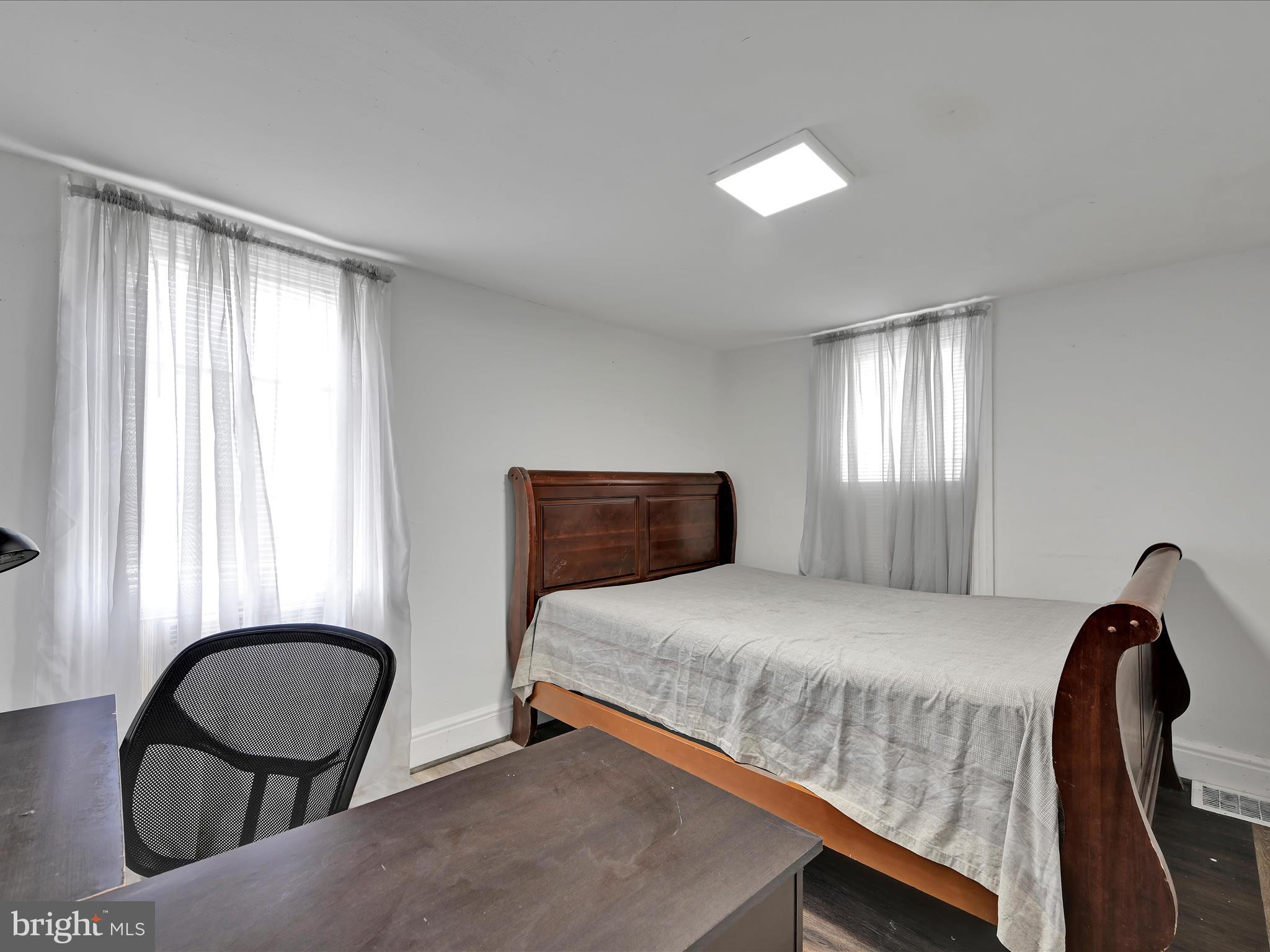 337 South 9th Street Lebanon, PA 17042 - Photo 20 of 26 a bedroom with a bed and a windows