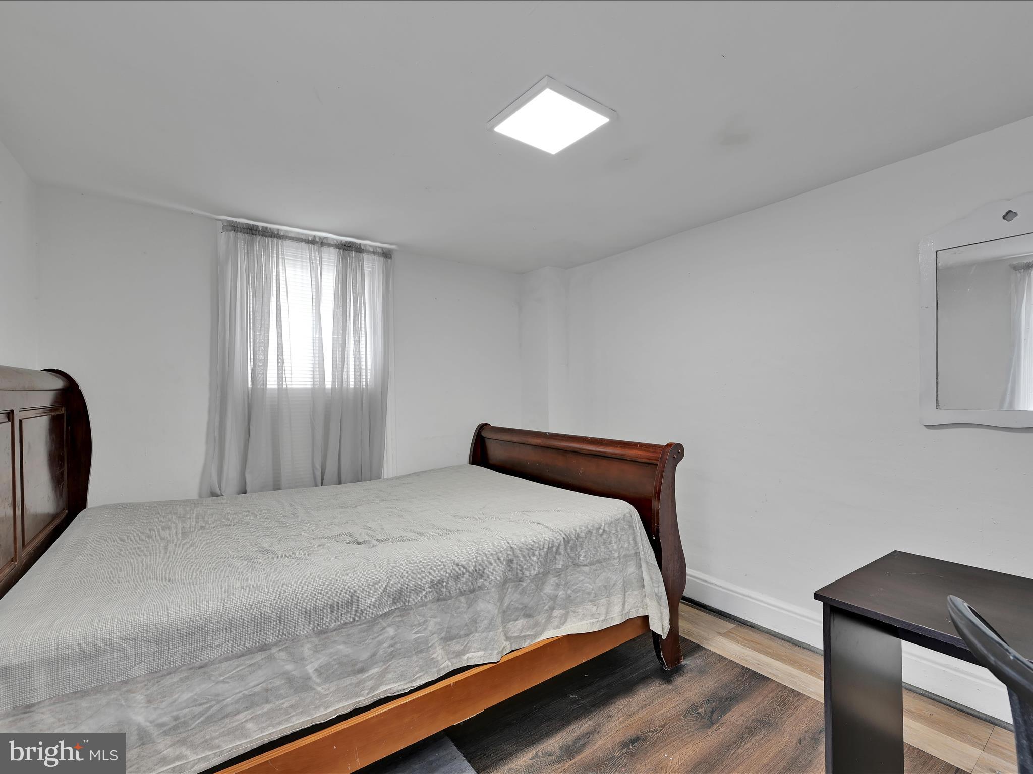 337 South 9th Street Lebanon, PA 17042 - Photo 21 of 26 a bedroom with a bed and a chair