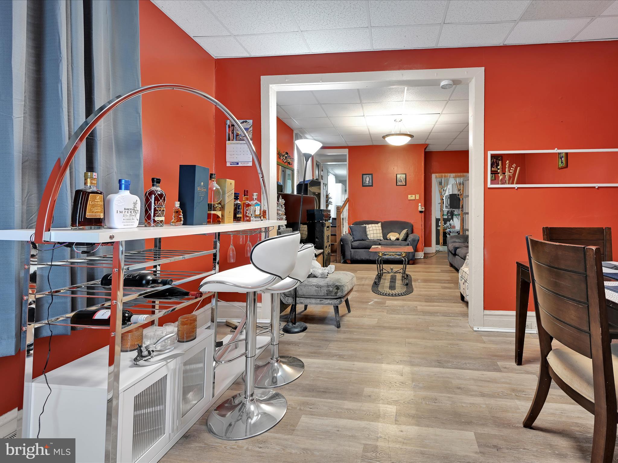 337 South 9th Street Lebanon, PA 17042 - Photo 6 of 26 a living room with furniture a large window and a potted plant