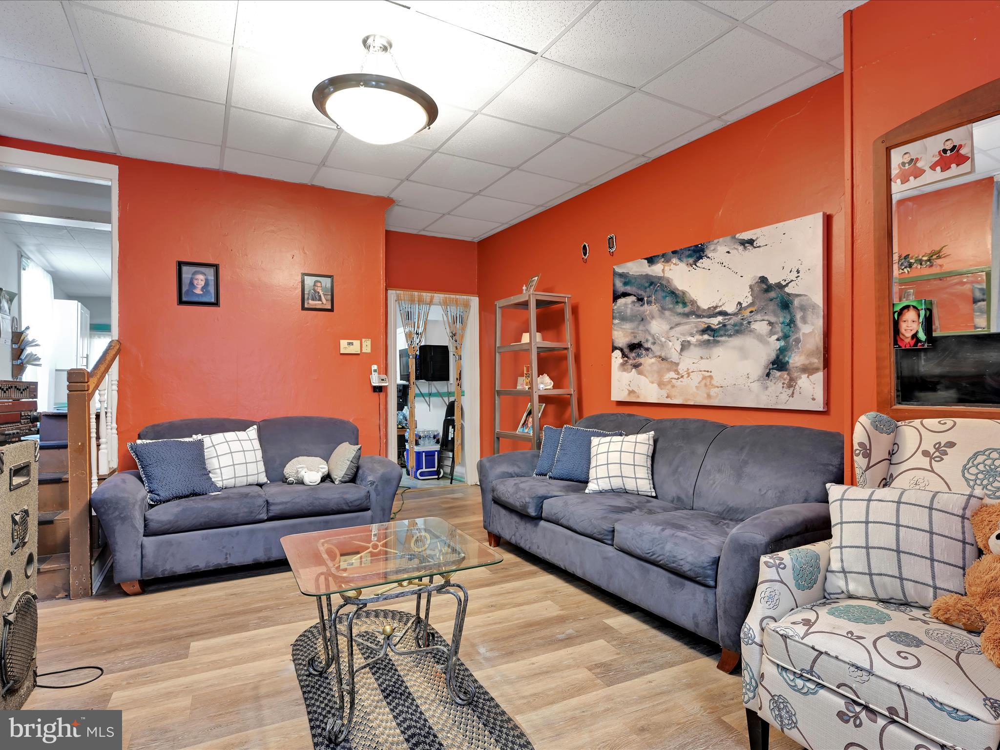 337 South 9th Street Lebanon, PA 17042 - Photo 8 of 26 a living room with furniture and wall painting