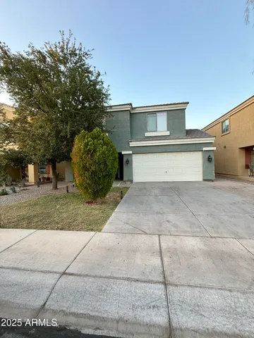 a house view with a outdoor space