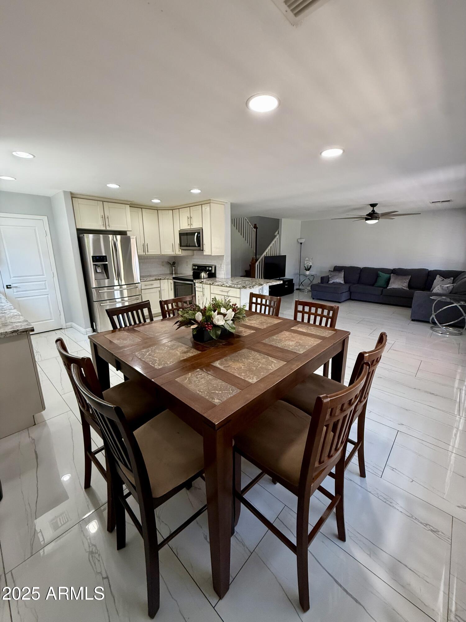 8534 West Cordes Road Tolleson, AZ 85353 - Photo 7 of 22 a outdoor dining space with furniture and rug