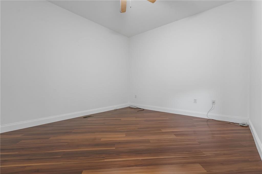 110 Aspen Lane Seven Fields, PA 16046 - Photo 20 of 50 a view of an empty room with wooden floor