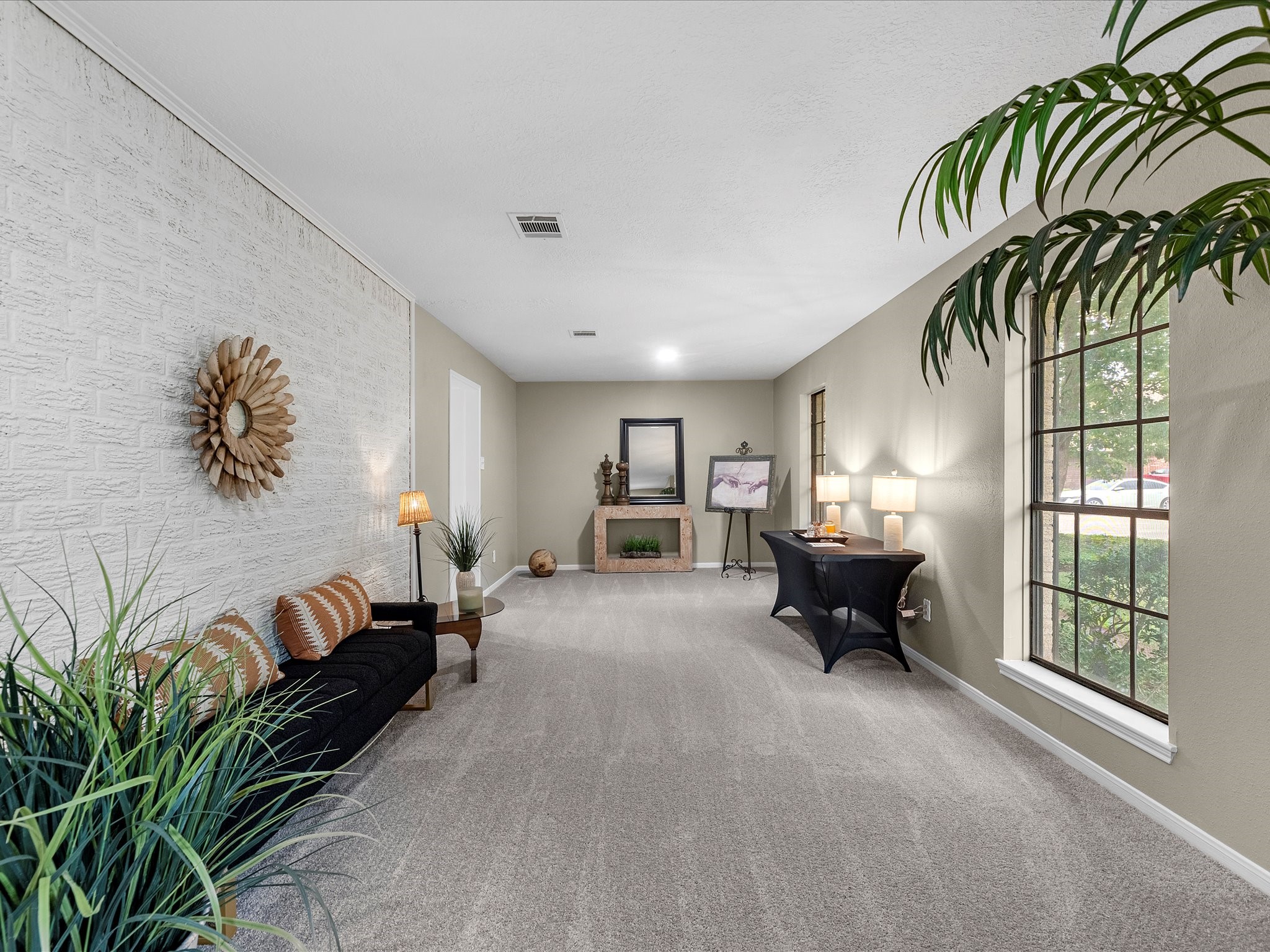 4002 Cujanes Street Pasadena, TX 77504 - Photo 13 of 26 a living room with furniture and a potted plant