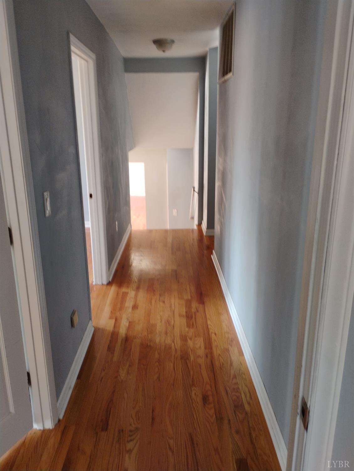 1316 Dudley Road Moneta, VA 24121 - Photo 55 of 61 BEDROOM HALLWAY TO LIVING AREA