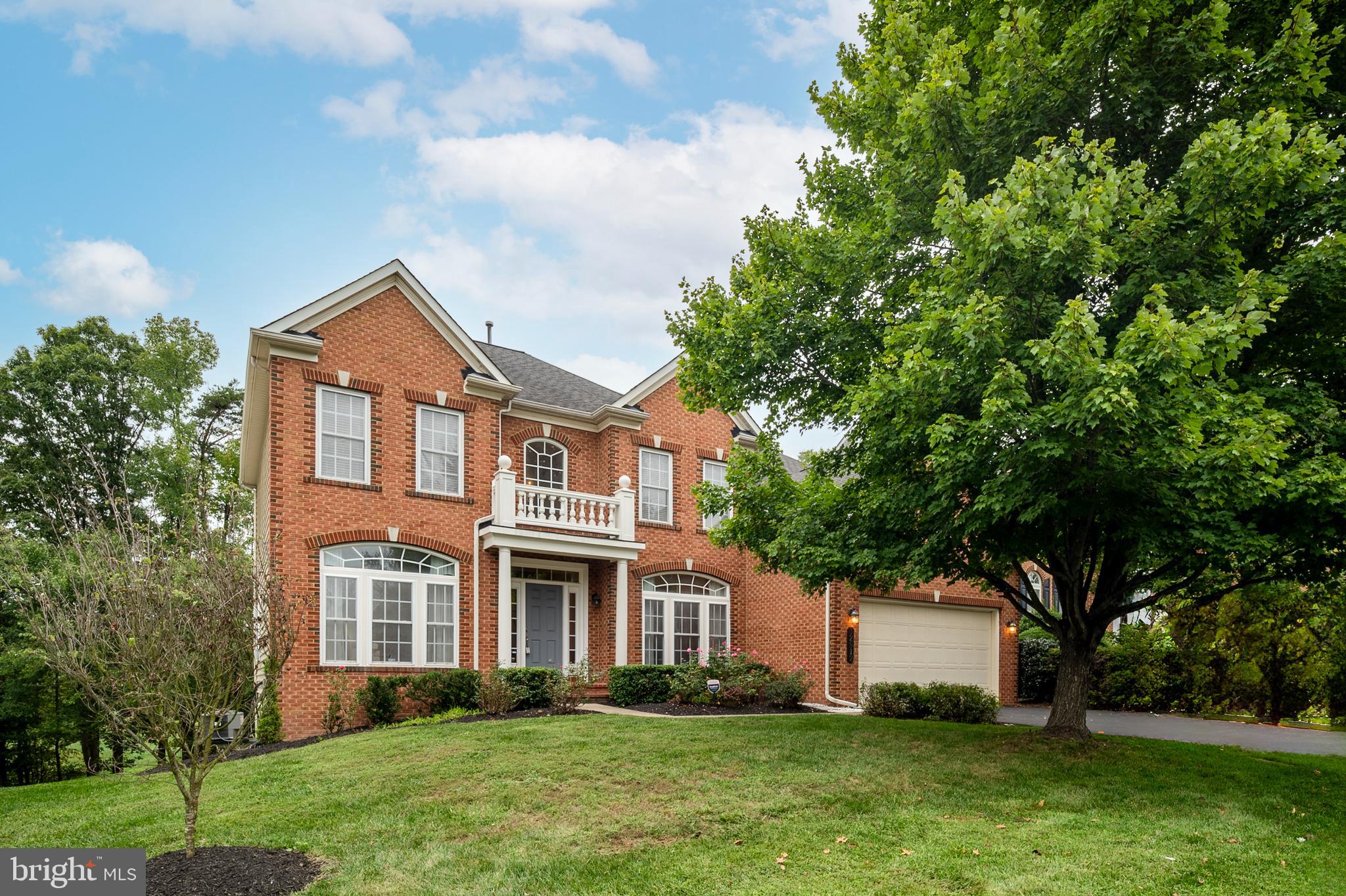 12912 Bay Hill Drive Beltsville, MD 20705 - Photo 1 of 60 a front view of house with yard and green space