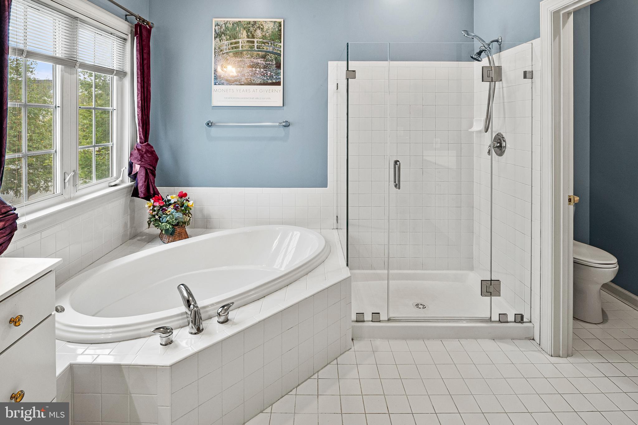 12912 Bay Hill Drive Beltsville, MD 20705 - Photo 33 of 60 a white bath tub sitting next to a white sink