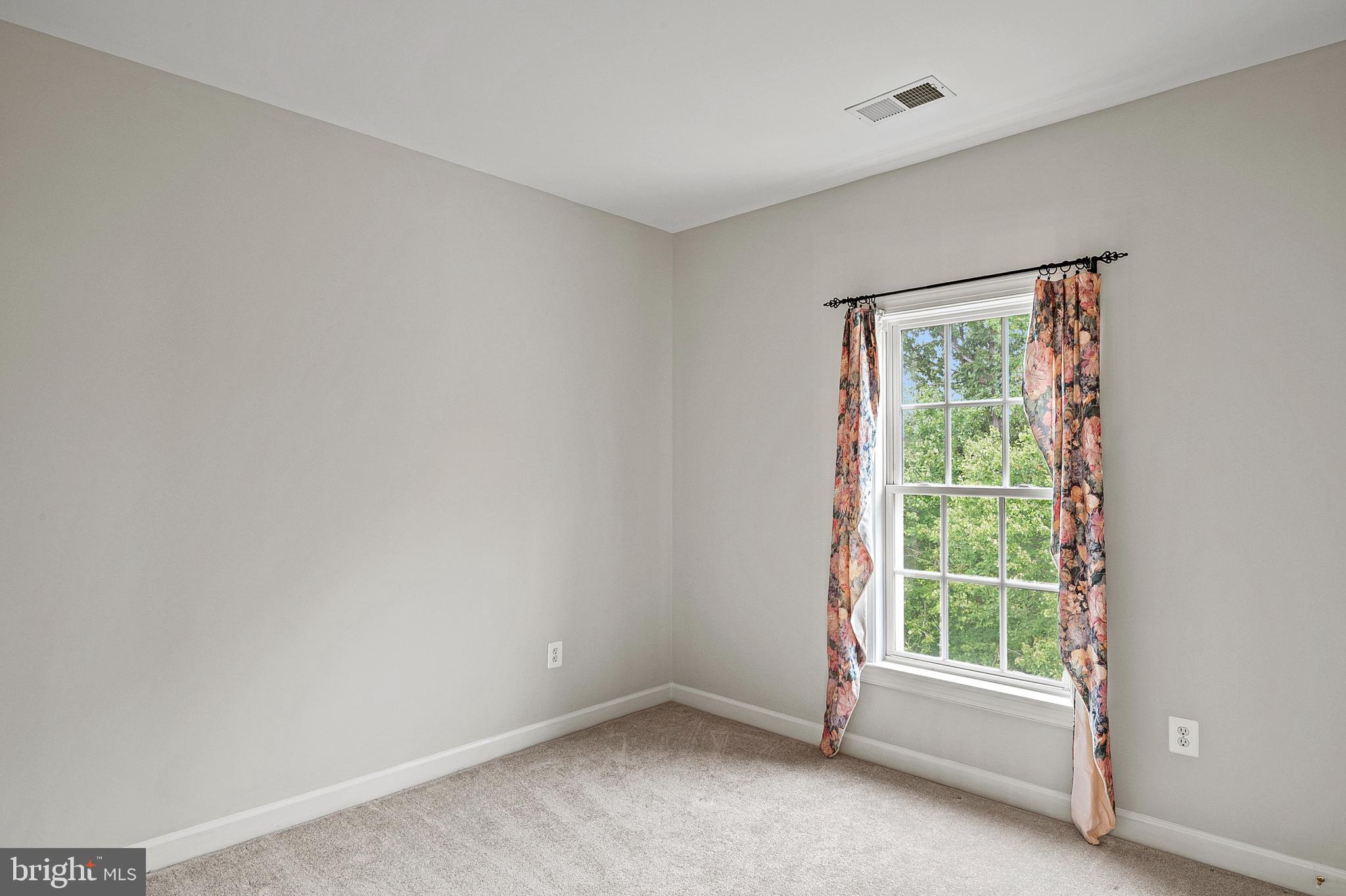 12912 Bay Hill Drive Beltsville, MD 20705 - Photo 37 of 60 an empty room with a window