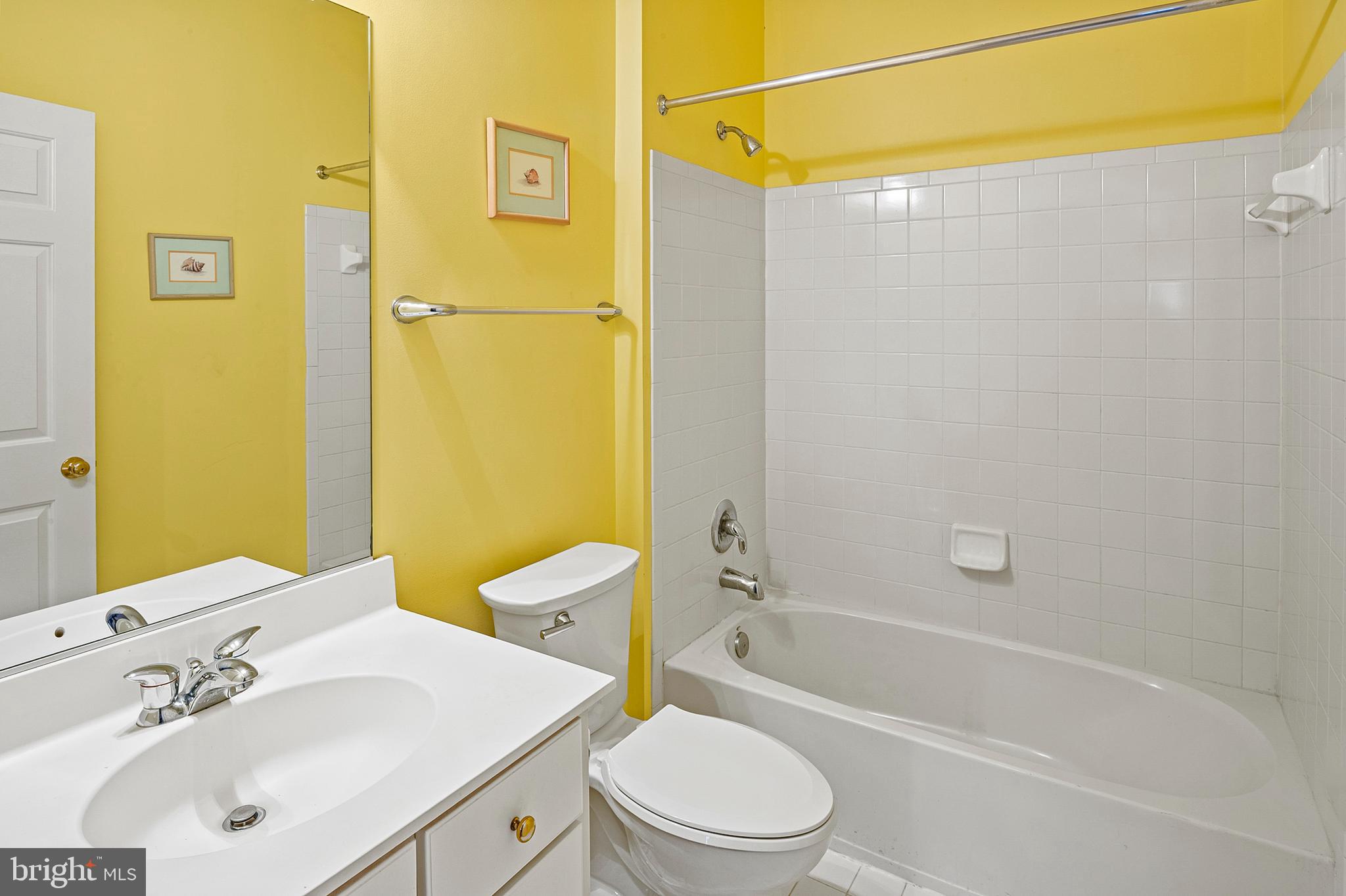 12912 Bay Hill Drive Beltsville, MD 20705 - Photo 41 of 60 a bathroom with a sink a toilet and shower