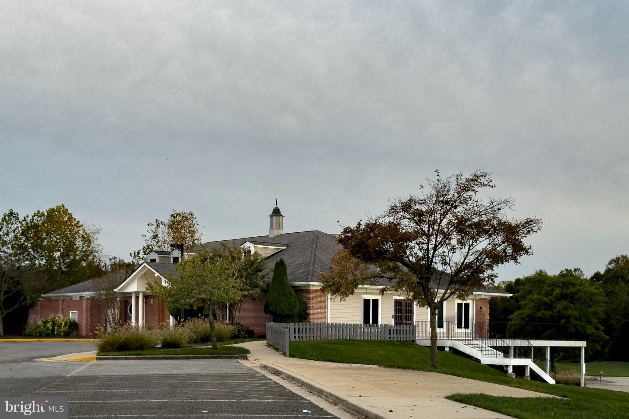 12912 Bay Hill Drive Beltsville, MD 20705 - Photo 53 of 60 a front view of a house with a yard