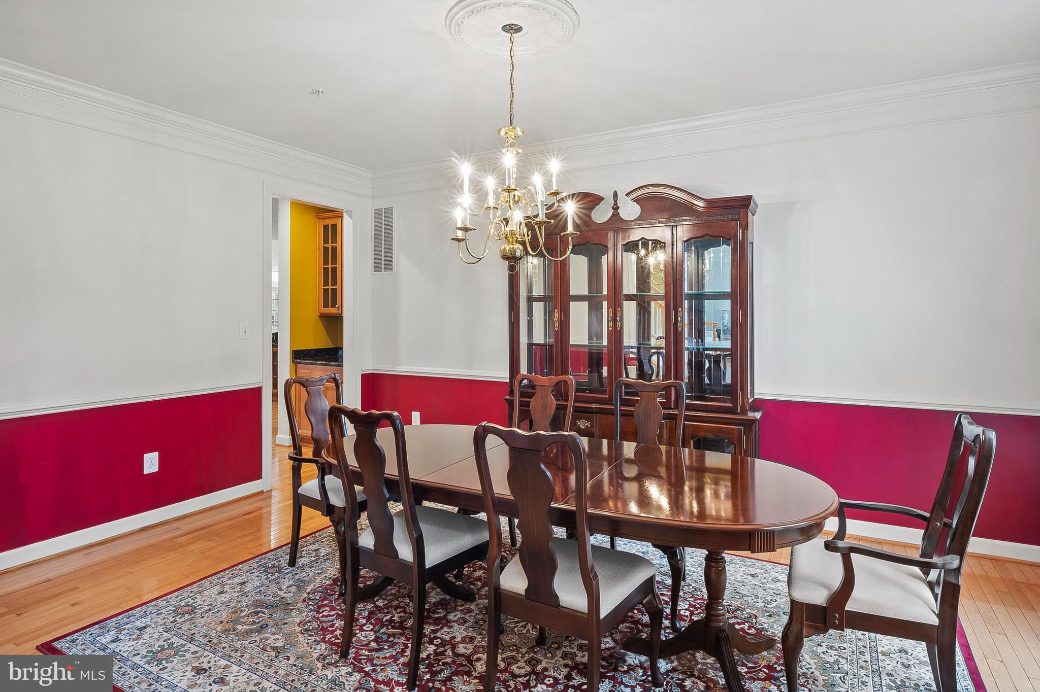 12912 Bay Hill Drive Beltsville, MD 20705 - Photo 8 of 60 a view of a dining room with furniture and chandelier